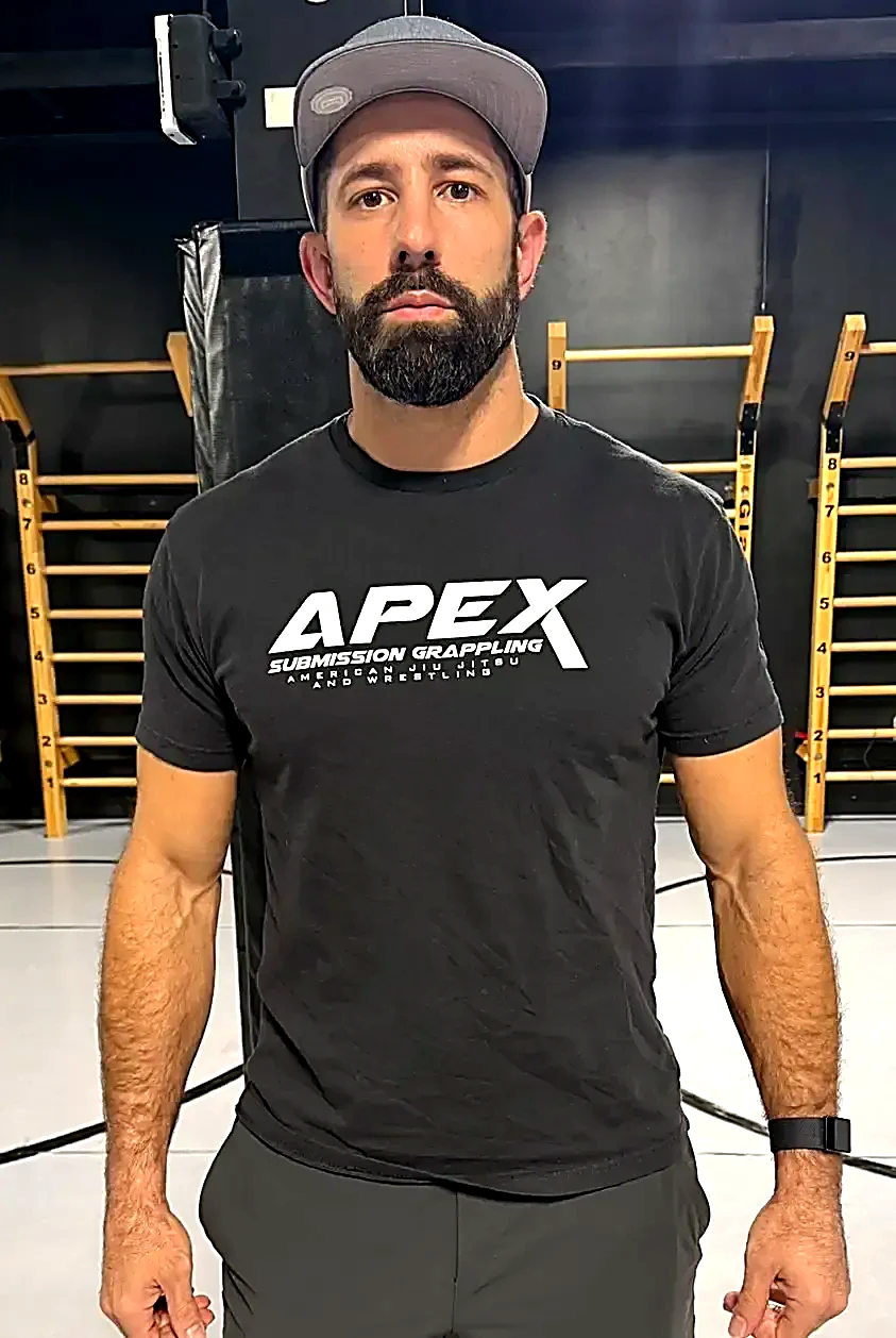 Coach Dan Scanlon leading wrestling class at APEX Sterling