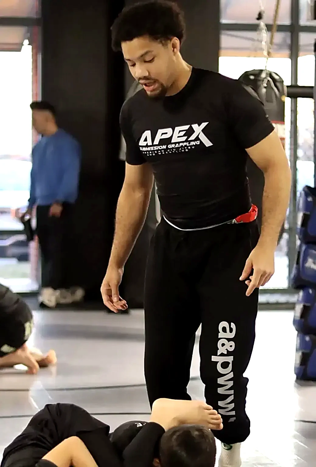 Coach Jamil Hill-Taylor teaching Jiu-Jitsu at APEX Sterling